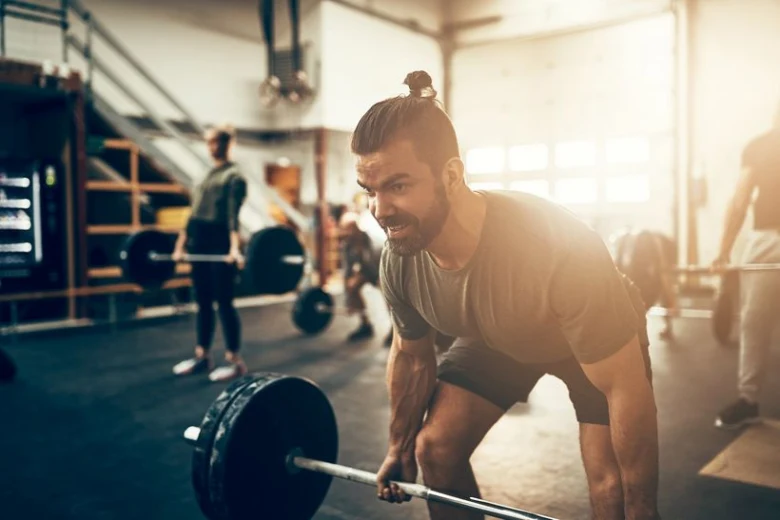Man lifting barbell