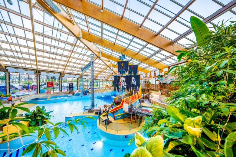 Indoor water park with pirate ship play area for children