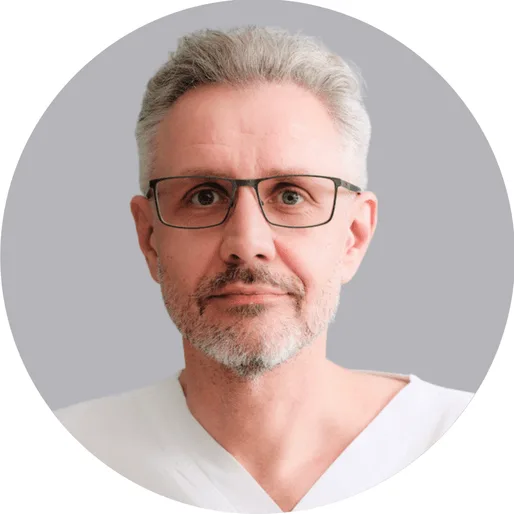 Man with glasses and grey hair