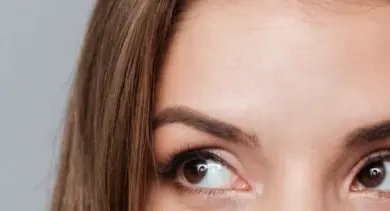 Woman's eyes looking up and to the side