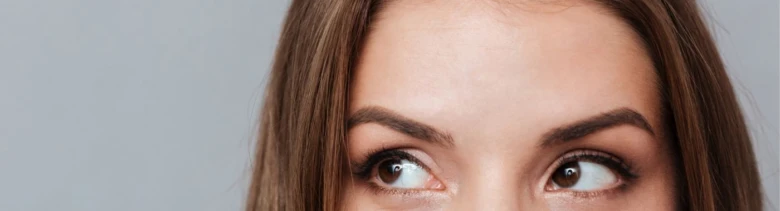 Woman's eyes looking up and to the side