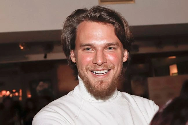 Smiling man with beard