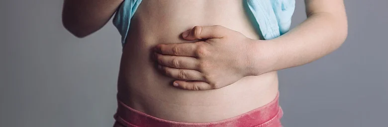Child holding stomach