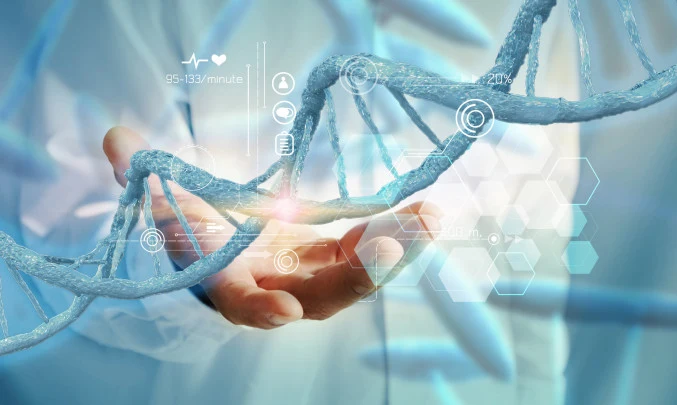 Ruka drží modrou dvojšpirálu DNA s digitálními grafy.