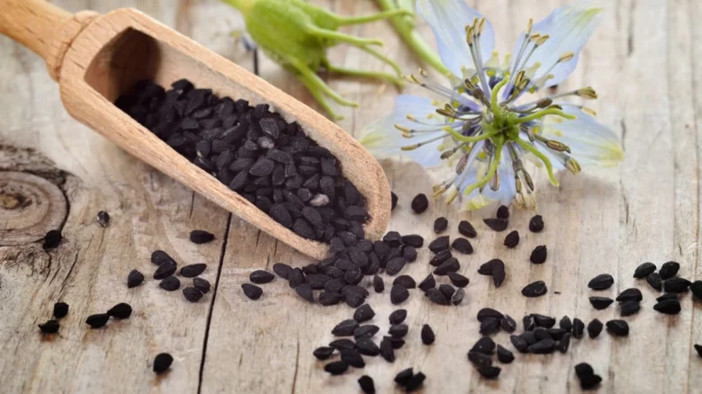 Black cumin seeds and flower