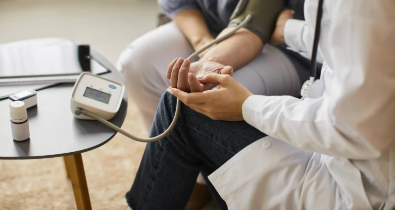 Doctor measuring blood pressure